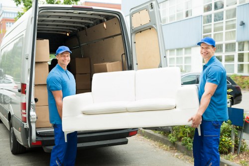 Removal van parked on a bustling Paddington street