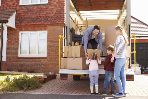 Customers unloading their belongings from a Josh Removal truck