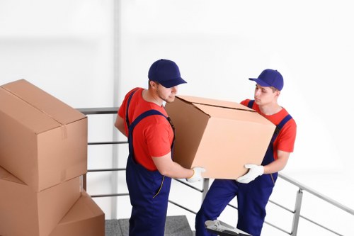 Man and van truck loaded with household items for a seamless move.