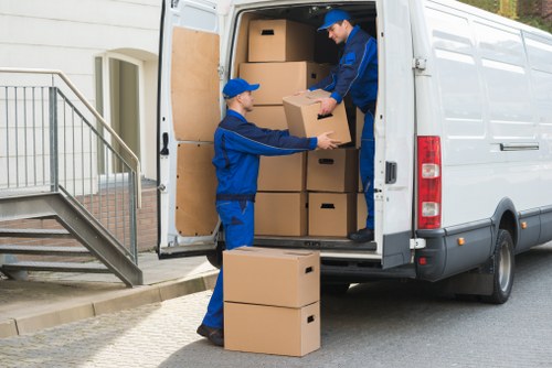 Experienced removal team loading a van