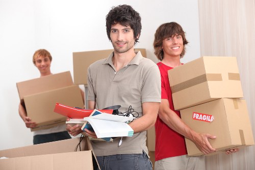 Professional removalist team loading a truck