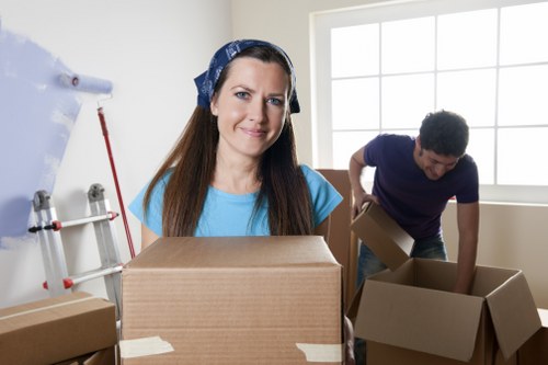 Professional movers handling furniture